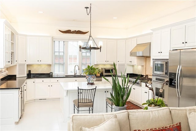 3022 Loridan Way SE, Atlanta, GA 30339 - kitchen with appliances with stainless steel finishes, a sink, extractor fan, a center island, and white cabinets