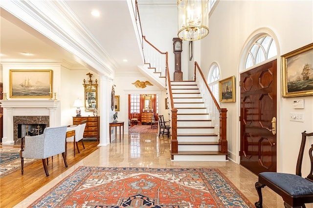 3022 Loridan Way SE, Atlanta, GA 30339 - entryway with marble tiled floors, stairway, ornamental molding, a premium fireplace, and recessed lighting