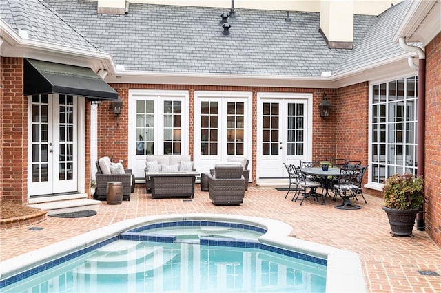 3022 Loridan Way SE, Atlanta, GA 30339 - view of swimming pool featuring french doors, a patio, an outdoor hangout area, a pool with connected hot tub, and outdoor dining space