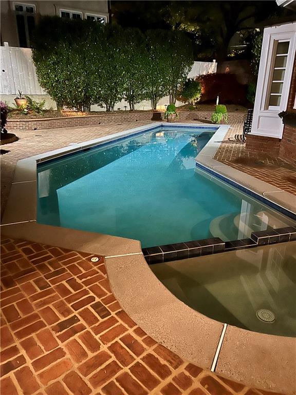 3022 Loridan Way SE, Atlanta, GA 30339 - view of pool featuring a pool with connected hot tub and a patio