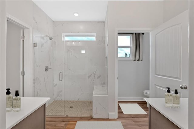 475 Azalea Xing, Dallas, GA 30132 - bathroom featuring a marble finish shower, vanity, toilet, and wood finished floors