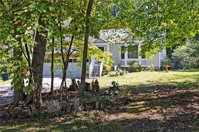 view of yard with a garage