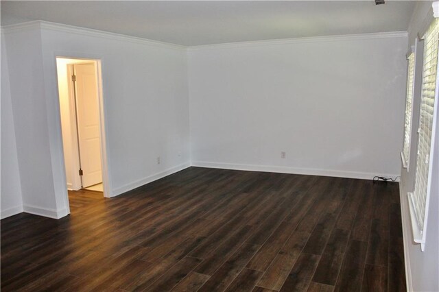 1191 Hampton Way NE, Atlanta, GA 30324 - empty room with dark wood-type flooring and ornamental molding