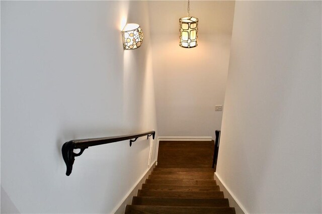 1191 Hampton Way NE, Atlanta, GA 30324 - stairs with baseboards and wood finished floors
