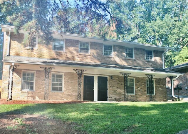 1191 Hampton Way NE, Atlanta, GA 30324 - view of front of home with a front lawn and brick siding