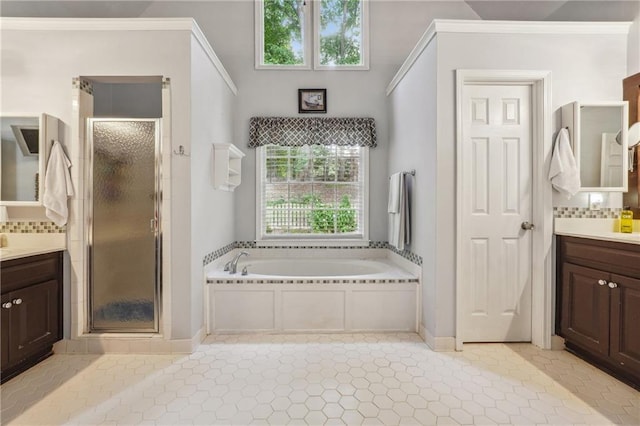 bathroom with tile patterned floors, vanity, and plus walk in shower