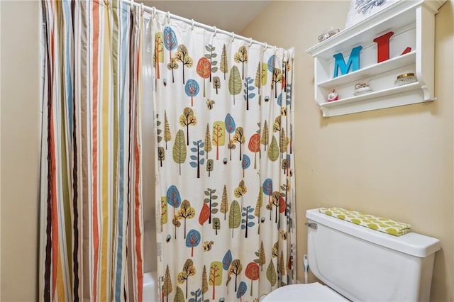 bathroom with toilet and shower / bathtub combination with curtain