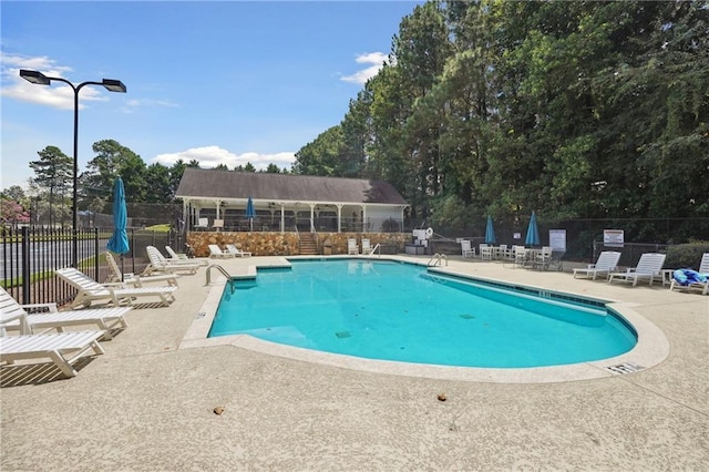 view of pool with a patio area