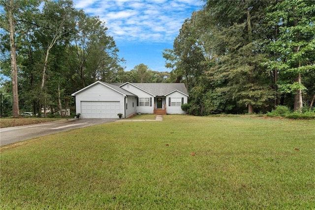 single story home featuring a front yard and a garage