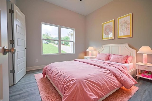 275 Green Commons Dr, Covington, GA 30016 - bedroom featuring wood finished floors and baseboards