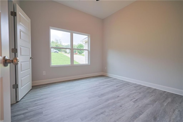275 Green Commons Dr, Covington, GA 30016 - empty room featuring wood finished floors and baseboards