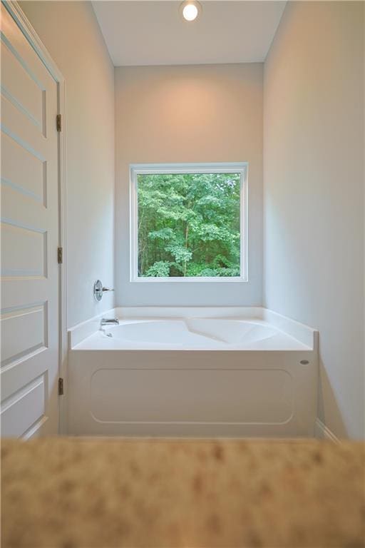 275 Green Commons Dr, Covington, GA 30016 - full bath featuring a bath and recessed lighting