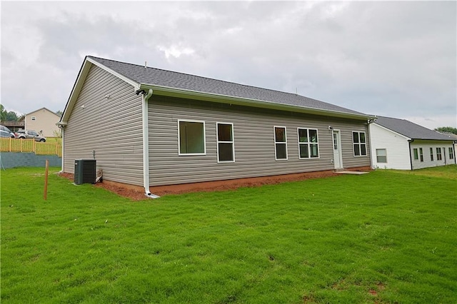 275 Green Commons Dr, Covington, GA 30016 - rear view of property with a lawn and cooling unit