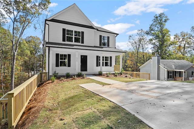 view of front of home featuring a front lawn