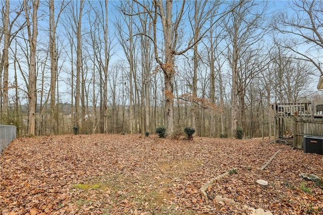 view of yard with central AC unit