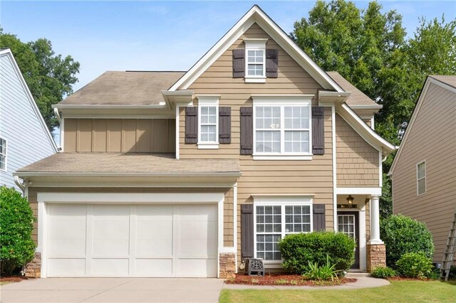 view of front of property with a garage