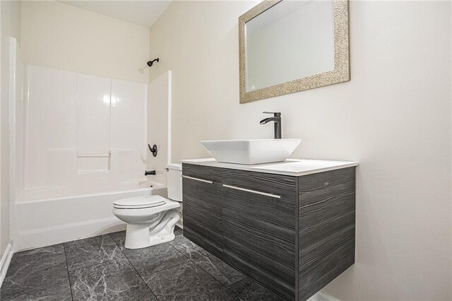 full bathroom featuring shower / bathtub combination, vanity, and toilet