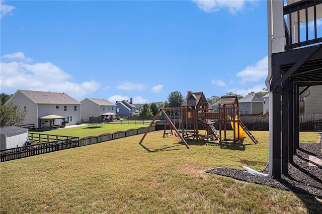 view of play area featuring a lawn