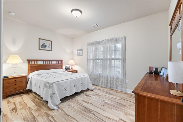 bedroom featuring light hardwood / wood-style flooring