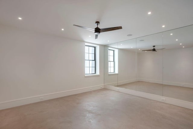 empty room featuring ceiling fan