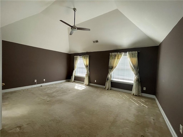 empty room featuring high vaulted ceiling, baseboards, visible vents, and ceiling fan