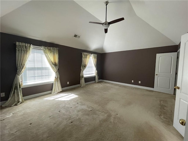 interior space with a ceiling fan, carpet flooring, visible vents, and baseboards