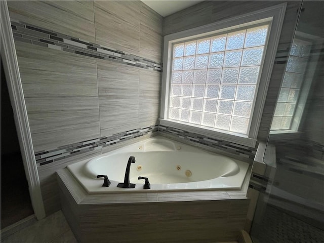 bathroom with a jetted tub