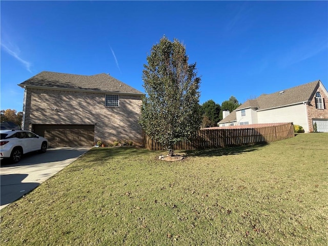 view of yard featuring a garage