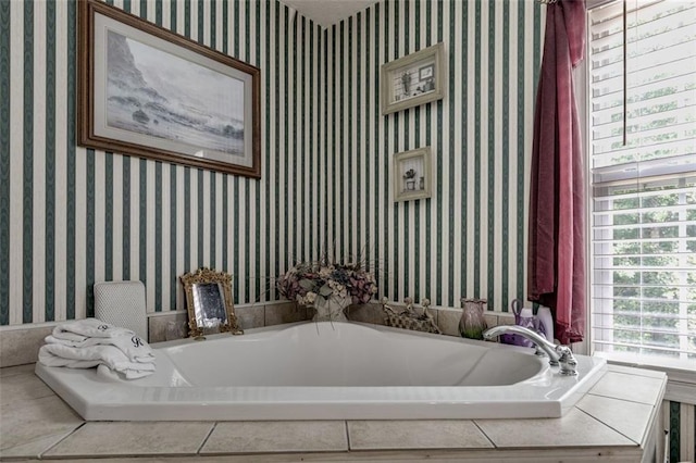 144 Bobs Dr SW, Mableton, GA 30126 - full bathroom featuring a bath and wallpapered walls