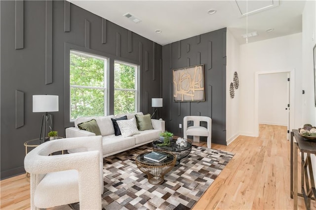 156 Martha Ave NE, Atlanta, GA 30317 - living area featuring attic access and light wood-style floors