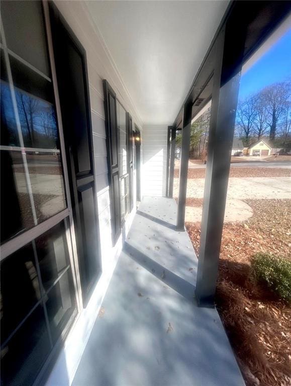 view of patio featuring a porch