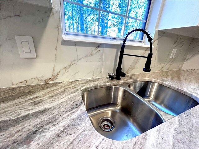 details with tasteful backsplash and sink