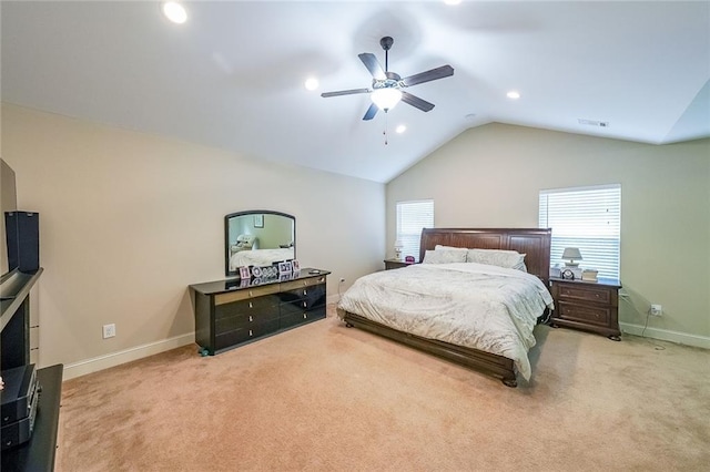 carpeted bedroom featuring lofted ceiling, visible vents, multiple windows, and baseboards