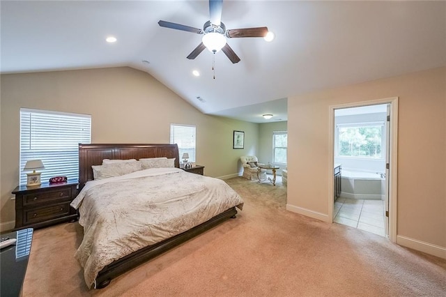 bedroom with ceiling fan, light colored carpet, visible vents, baseboards, and vaulted ceiling