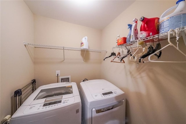 laundry room with laundry area and separate washer and dryer