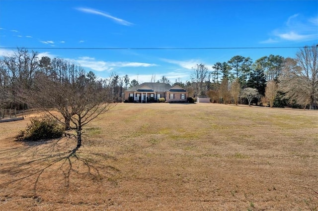 exterior space with a front lawn