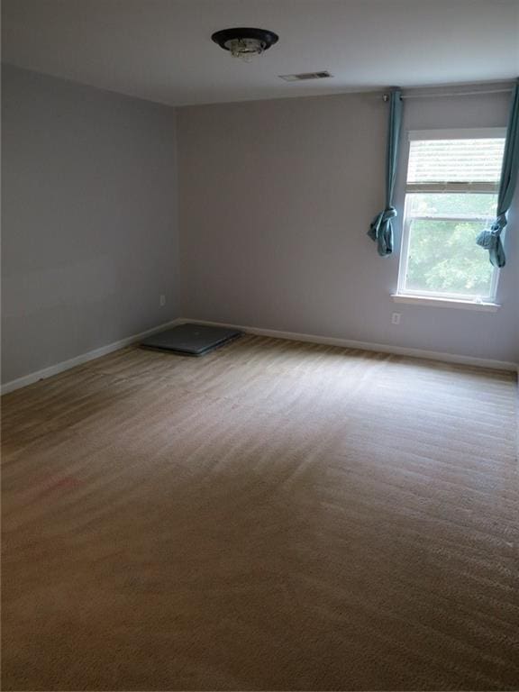 58 Torero Trl, Newnan, GA 30263 - unfurnished room with baseboards and carpet