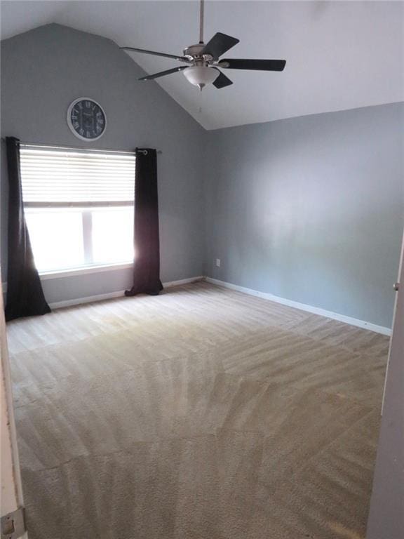 58 Torero Trl, Newnan, GA 30263 - unfurnished room featuring a ceiling fan, lofted ceiling, carpet, and baseboards