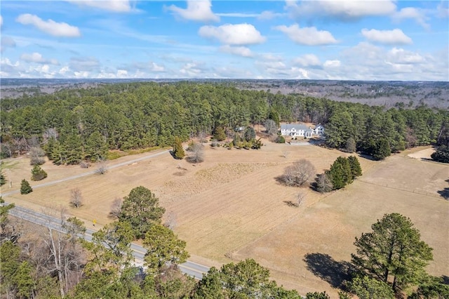 aerial view with a wooded view