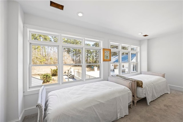 carpeted bedroom with baseboards and recessed lighting