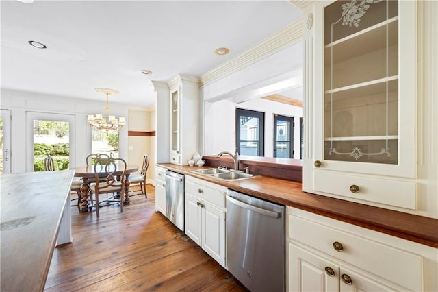 kitchen featuring a sink, wood counters, glass insert cabinets, and dishwasher