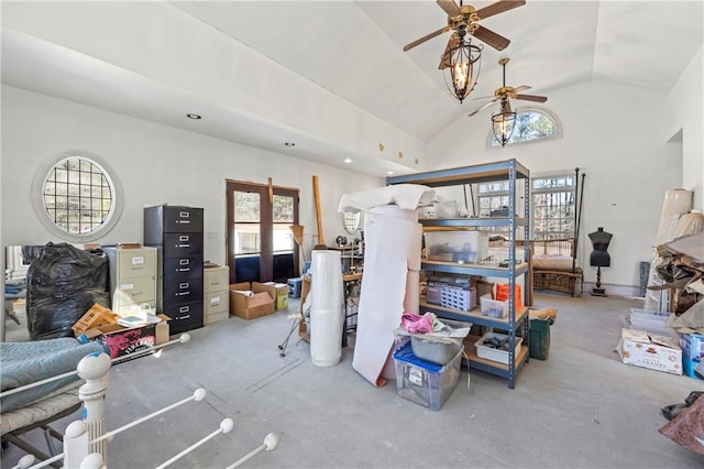 interior space with high vaulted ceiling and a ceiling fan