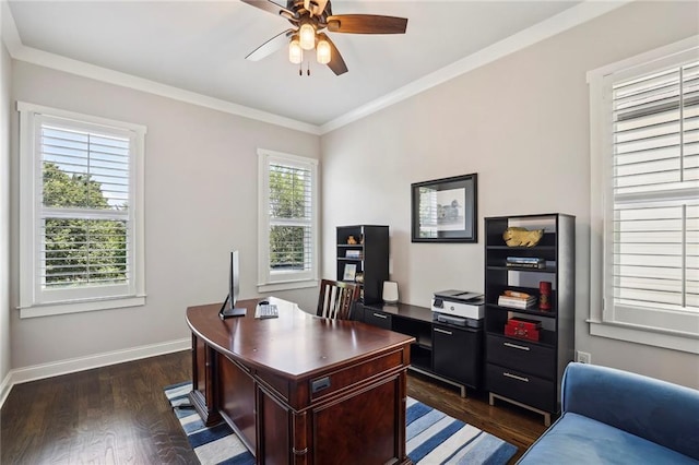 home office featuring crown molding, baseboards, dark wood-type flooring, and a ceiling fan