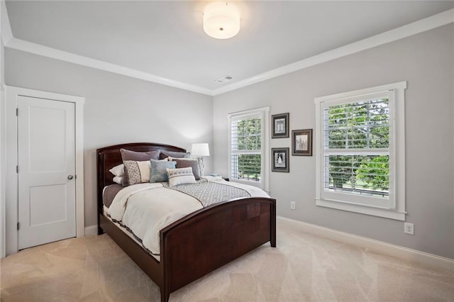 bedroom with light carpet, baseboards, visible vents, and crown molding