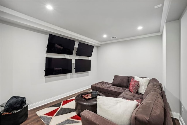 living room featuring visible vents, baseboards, dark wood-type flooring, and recessed lighting