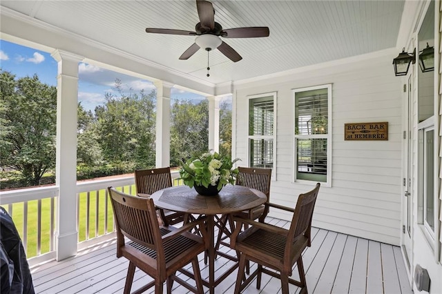 sunroom / solarium with ceiling fan