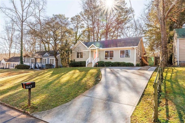 view of front facade with a front yard