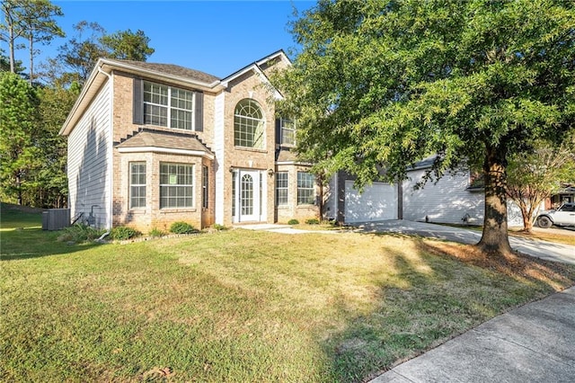 view of front of property featuring central AC unit and a front yard