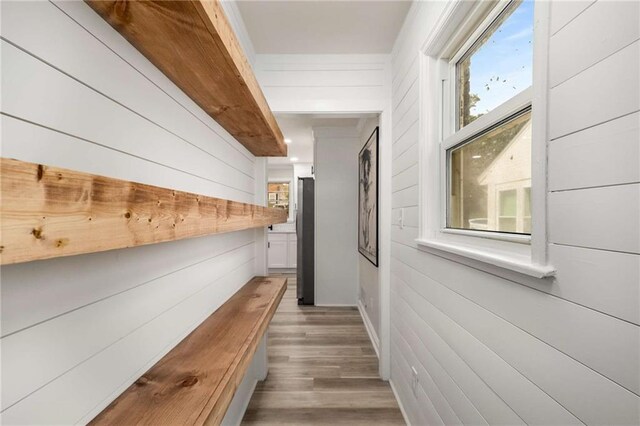 1282 Westridge Rd SW, Atlanta, GA 30311 - corridor with light wood-style flooring and wood walls