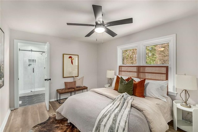1282 Westridge Rd SW, Atlanta, GA 30311 - bedroom with ceiling fan, baseboards, wood finished floors, and ensuite bathroom